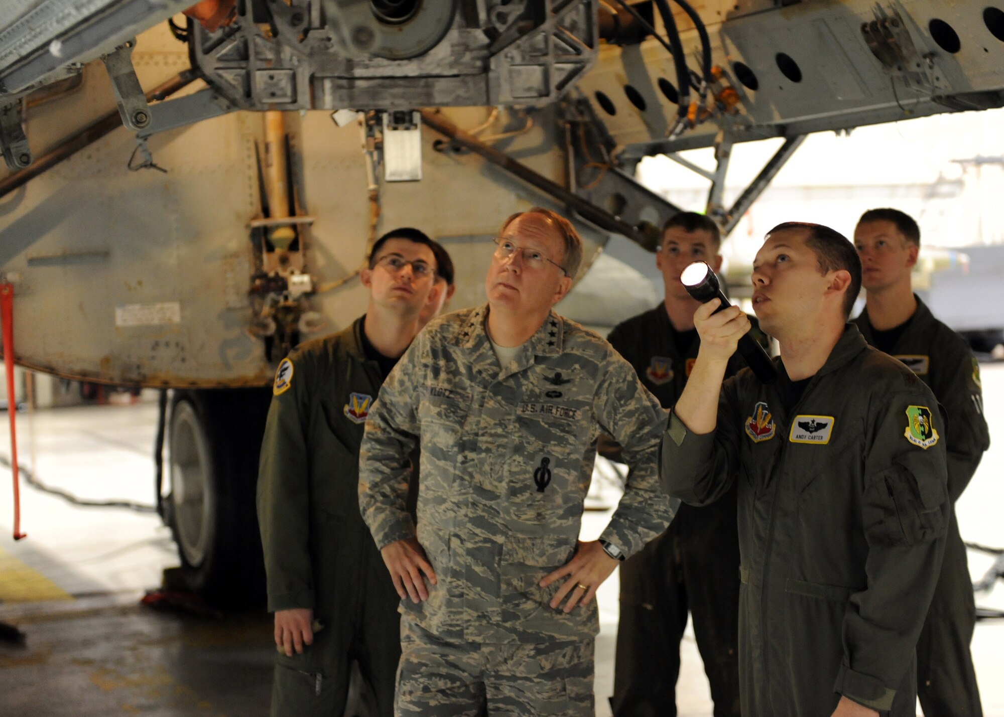MINOT AIR FORCE BASE, N.D. -- Lt. Gen. Frank G. Klotz, Global Strike Command commander, discusses the capabilities of a B-52H Stratofortress with Capt. Matt Guasco, 23rd Bomb Squadron aircraft commander, while others look on here, Oct. 28. The general is here to meet members of Minot AFB and the local community. He is scheduled to be the featured speaker at the Minot Chamber of Commerce annual meeting and luncheon in Minot Oct. 29. (U.S. Air Force photo by Staff Sgt. Keith Ballard)