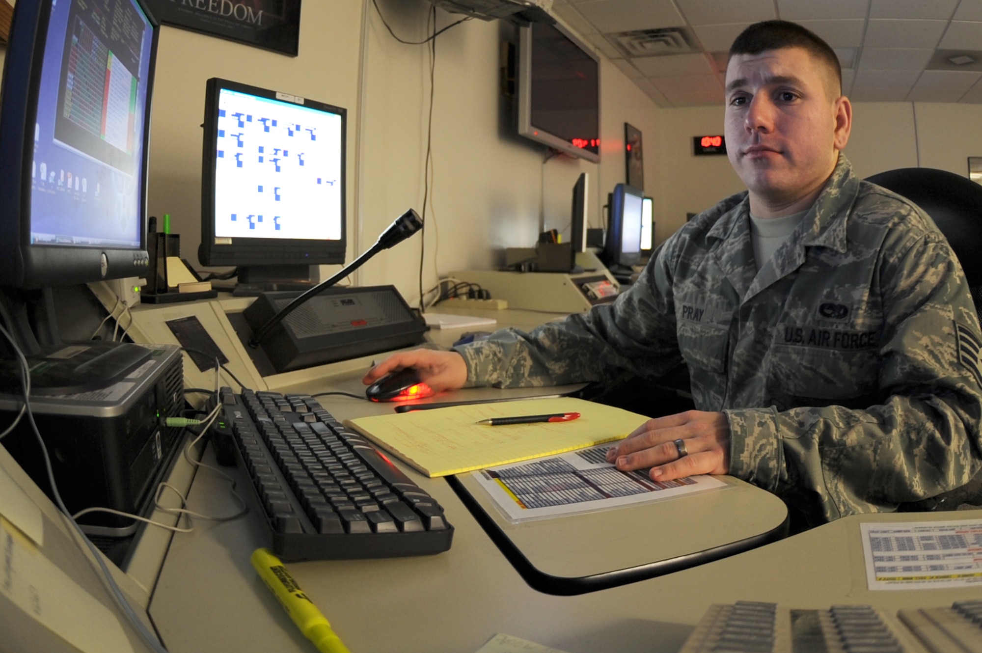 WHITEMAN AIR FORCE BASE, Mo. - Staff Sgt. Daniel Pray, 509th Maintenance Operations Squadron Maintenance Operations controller, coordinates maintenance activities on the B-2 fleet, Nov. 4. The MOC provides an accurate and timely manner reporting of information and coordination of resources in support of aircraft maintenance for the 509th Bomb Wing. (U.S. Air Force photo/Airman 1st Class Carlin Leslie)  (Released)