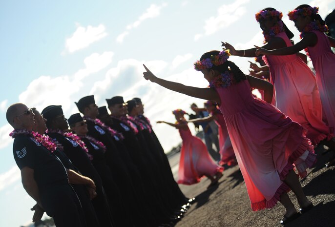 U.S. Air Force Thunderbirds are greeted by local Hawaiian school children upon arrival at Hickam Air Force Base, Sept. 16.  Hickam AFB is the first stop on the team's 6-week Far East tour.  (U.S. Air Force photo by Staff Sgt. Kristi Machado)