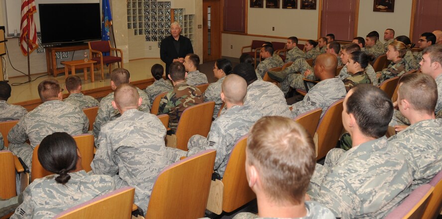 Barksdale AFB, La. - Chief Master Sgt. of the Air Force #5 Robert Gaylor speaks to Airmen from the Airmen Leadership School in their auditorium Oct. 28. He discussed the various types of investing for the Airmen’s future. (U.S. Air Force photo by Senior Airman Alexandra Longfellow) (RELEASED)
