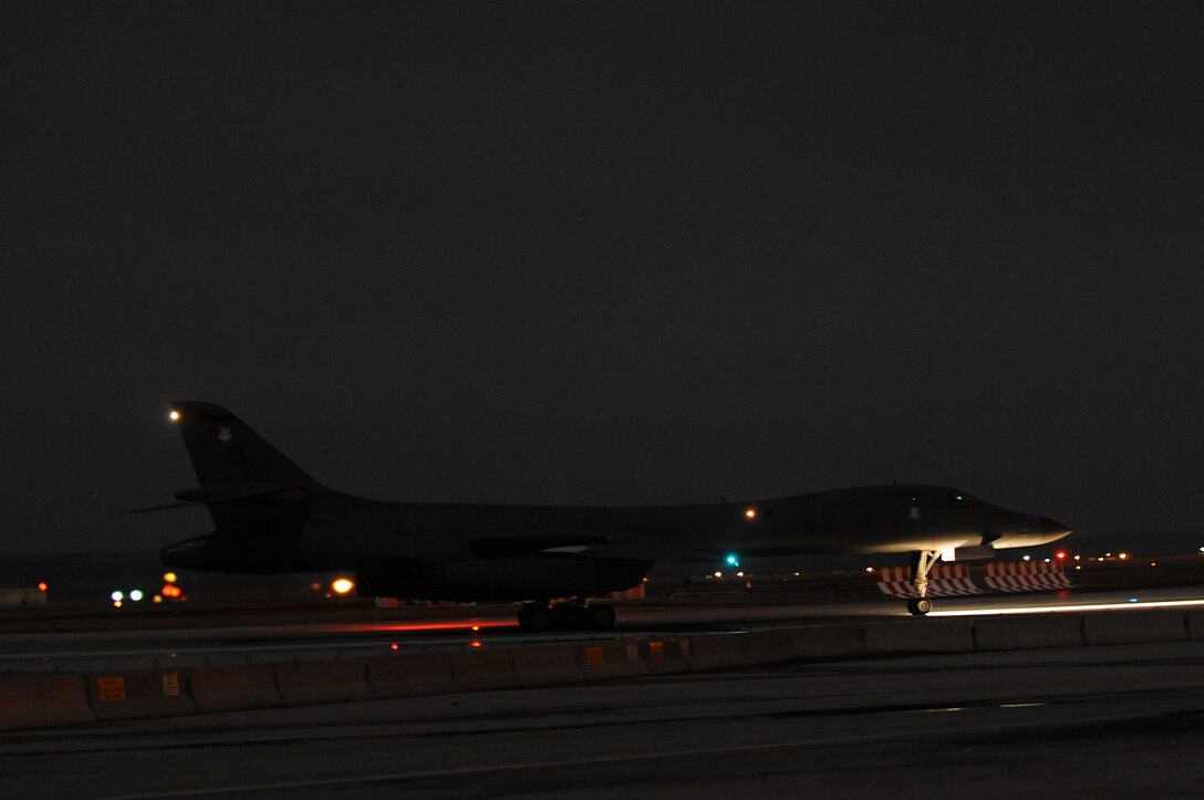 ELLSWORTH AIR FORCE BASE, S.D. -- A B-1B Lancer taxis down the runway after performing a nighttime training mission, Nov 2. The B-1 can deliver massive quantities of precision and nonprecision weapons against any adversary, anywhere in the world. (U.S. Air Force photo/Airman 1st Class Joshua J. Seybert)