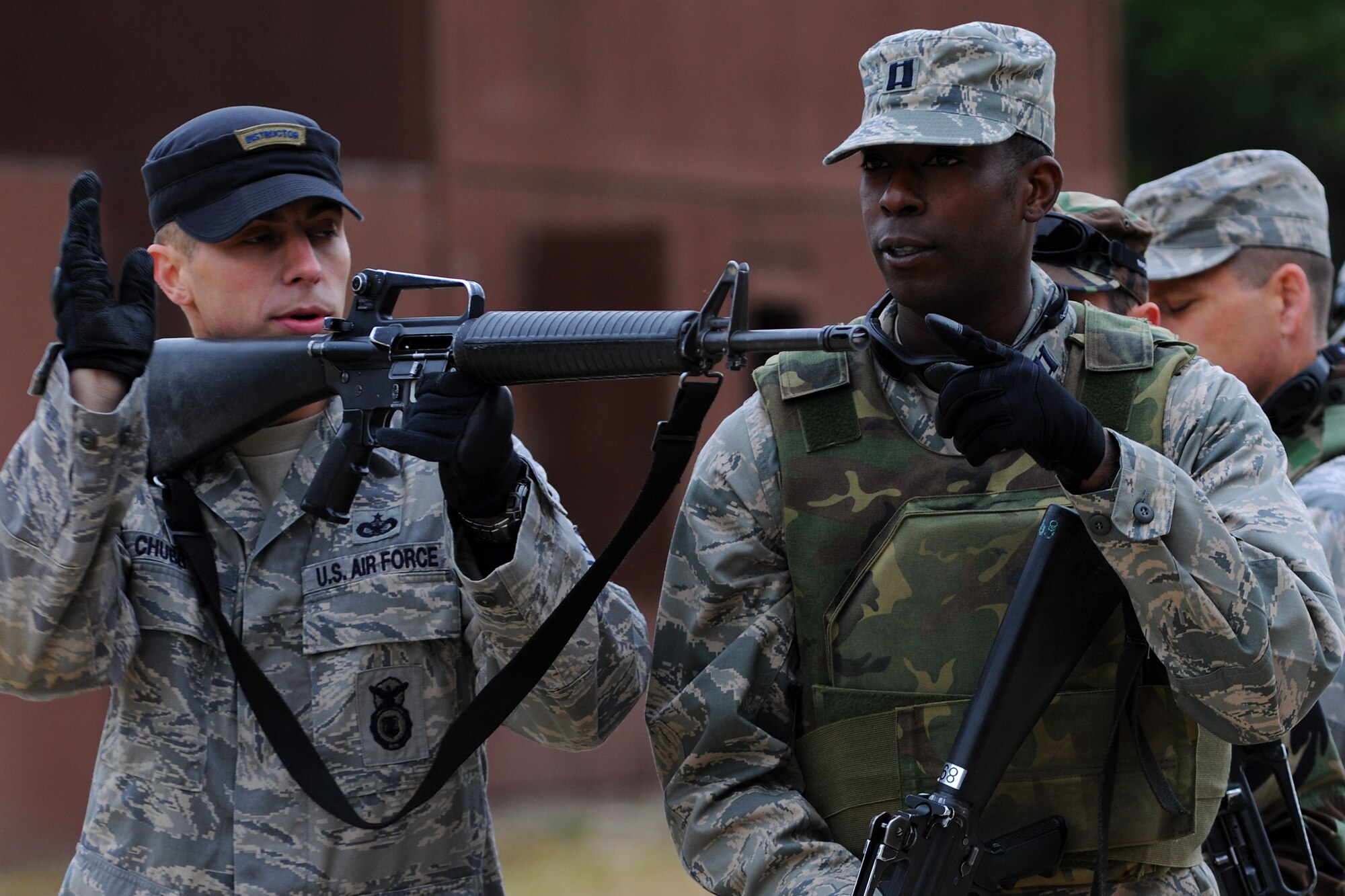 Staff Sgt. James Chubb, a training instructor with the 421st Combat Training Squadron at the U.S. Air Force Expeditionary Center offers guidance to students during a Judge Advocate course in October.  (U.S. Air Force photo/Staff Sgt. Nathan Bevier)