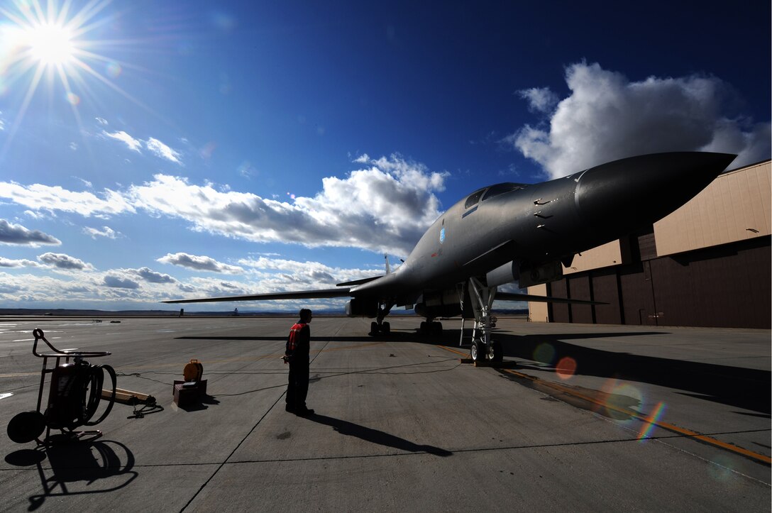 ELLSWORTH AIR FORCE BASE, S.D. -- Airman 1st Class Jeremiah Hand, 28th Maintenance Squadron crew chief, waits to speak with a B-1B Lancer crew upon completion of a flight, Nov. 2. Pilots brief crew chiefs aircraft performance during missions. (U.S. Air Force photo/Airman 1st Class Joshua J. Seybert)