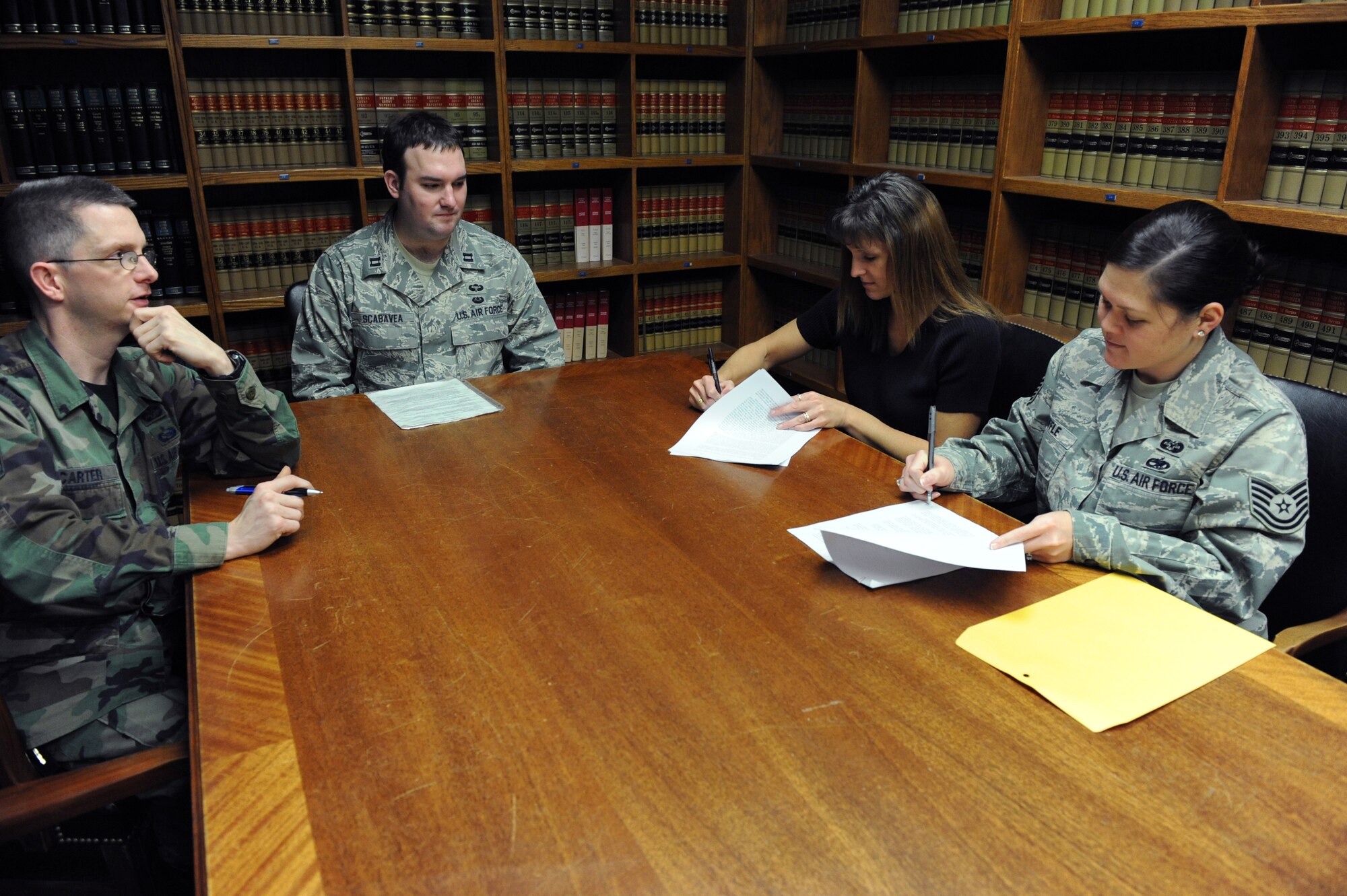MINOT AIR FORCE BASE, N.D. -- Members of the base legal office demonstrate will procedures here Nov. 3.  A will is a written legal declaration of how personal property should be distributed after death. The base legal office is having a "Will week" Nov. 30 to Dec. 4 and can assist people in preparing a Will. (U.S. Air Force photo by Senior Airman Sharida Jackson).