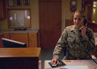 MINOT AIR FORCE BACE, N.D. -- Airman 1st Class Amanda Whittaker, 5th Force Support Squadron guest service representative, reserves a room for an Airman over the phone at the Sakakawea Inn here, Nov. 3. Making reservations such as these is important to ensure a comfortable stay while visiting Minot AFB. (U.S. Air Force photo by Senior Airman Michael Veloz)
