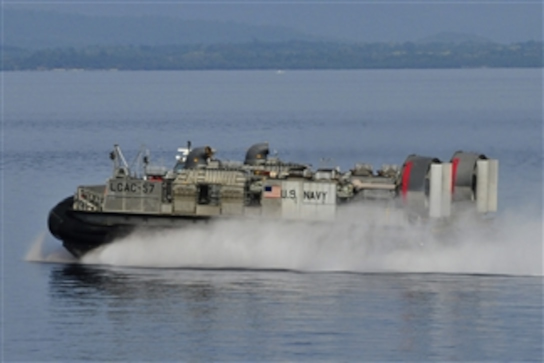 A landing craft, air cushion departs the well deck of the amphibious dock landing ship USS Harpers Ferry (LSD 49) during the Amphibious Landing Exercise (PHIBLEX) in the South China Sea near Puerto Princesa, Philippines, on Oct. 20, 2009.  The Harpers Ferry, the amphibious dock landing ship USS Tortuga (LSD 46) and the Marine Corps 31st Marine Expeditionary Unit are participating in PHIBLEX, an annual bilateral amphibious landing training exercise between the United States and the Armed Forces of the Philippines.  