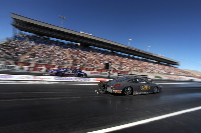 LAS VEGAS -- Pro Stock cars race down the quarter mile track during the National Hot Rod Association Las Vegas Nationals, at the Las Vegas Motor Speedway Oct. 31, 2009. A competitive Pro Stock cars can reach speeds over 200 mph.
 (U.S. Air Force photo by Tech. Sgt. Michael R. Holzworth)(released)