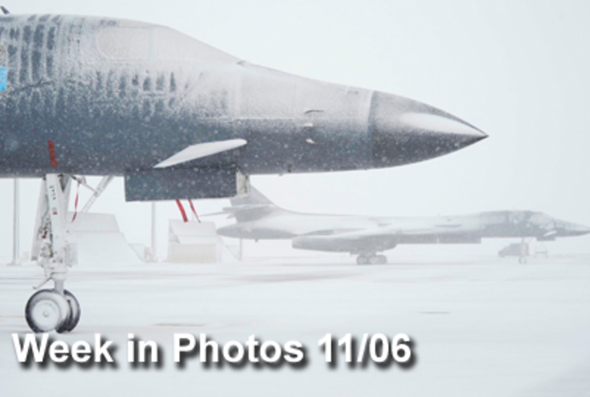 Air Force Week in Photos for Nov. 6 highlights photos from around the Air Force. In this photo by Airman 1st Class Corey Hook, the first big snowfall of the winter season collects on B-1B Lancers at the Ellsworth Air Force Base, S.D., flightline Oct. 29, 2009. (U.S. Air Force illustration)