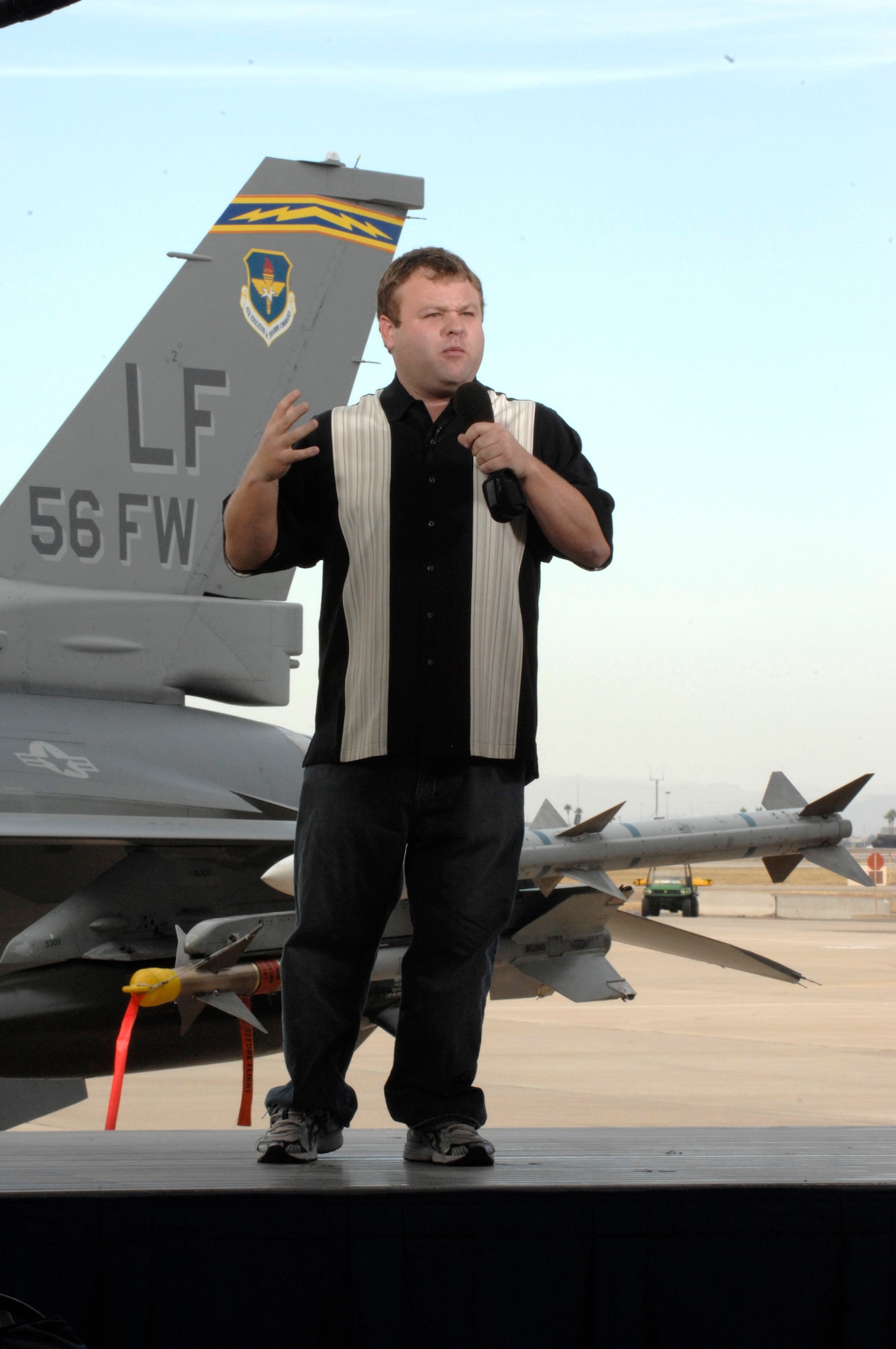 Comedian Frank Caliendo performs his portion of FOX NFL Sunday pregame show Nov. 4, 2009, at Luke Air Force Base, Ariz. The show will air Nov. 8, 2009, for a military audience at undisclosed military installation in Afghanistan.(U.S. Air Force photo by Staff Sgt. Gary Mathieson)