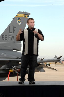 Comedian Frank Caliendo performs his portion of FOX NFL Sunday pre-game show Nov. 4, 2009, at Luke Air Force Base, Ariz. The show is scheduled to air Nov. 8, 2009, for a military audience at a military installation in Afghanistan.(U.S. Air Force photo/ Staff Sgt. Gary Mathieson)