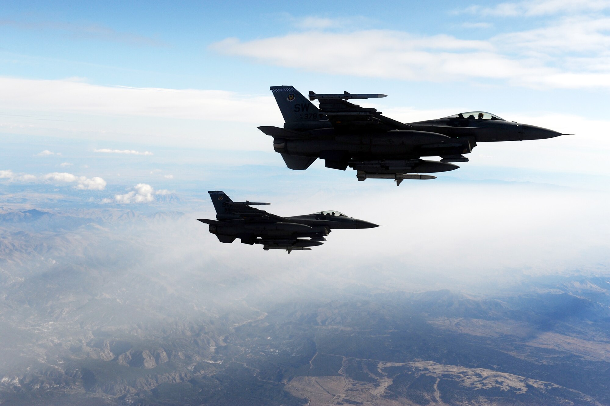 F-16 Fighting Falcons from Shaw Air Force Base, S.C. head out to the Nevada Test and Training Range, Oct. 29, 2009, during Red Flag 10-1. Red Flag is a realistic combat training exercise involving the air forces of the United States and its allies. The exercise is one of a series of advanced training programs administered by the U.S. Air Force Warfare Center. (U.S. Air Force photo/Airman 1st Class Brett Clashman)