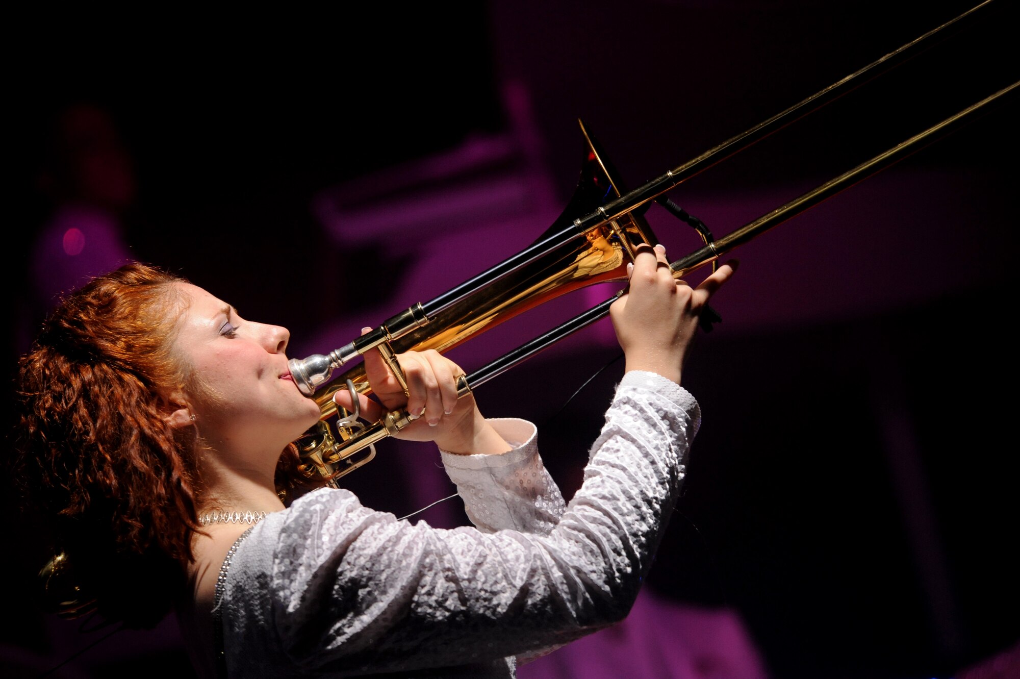VALDOSTA, Ga. -- Senior Airman Victoria Howard, Tops in Blue instrumentalist, plays the trombone during a performance at Mathis Auditorium here Nov. 4. The team rehearses for two months before going on a 10-month tour across the world. (U.S. Air Force photo by Senior Airman Gina Chiaverotti-Paige)
