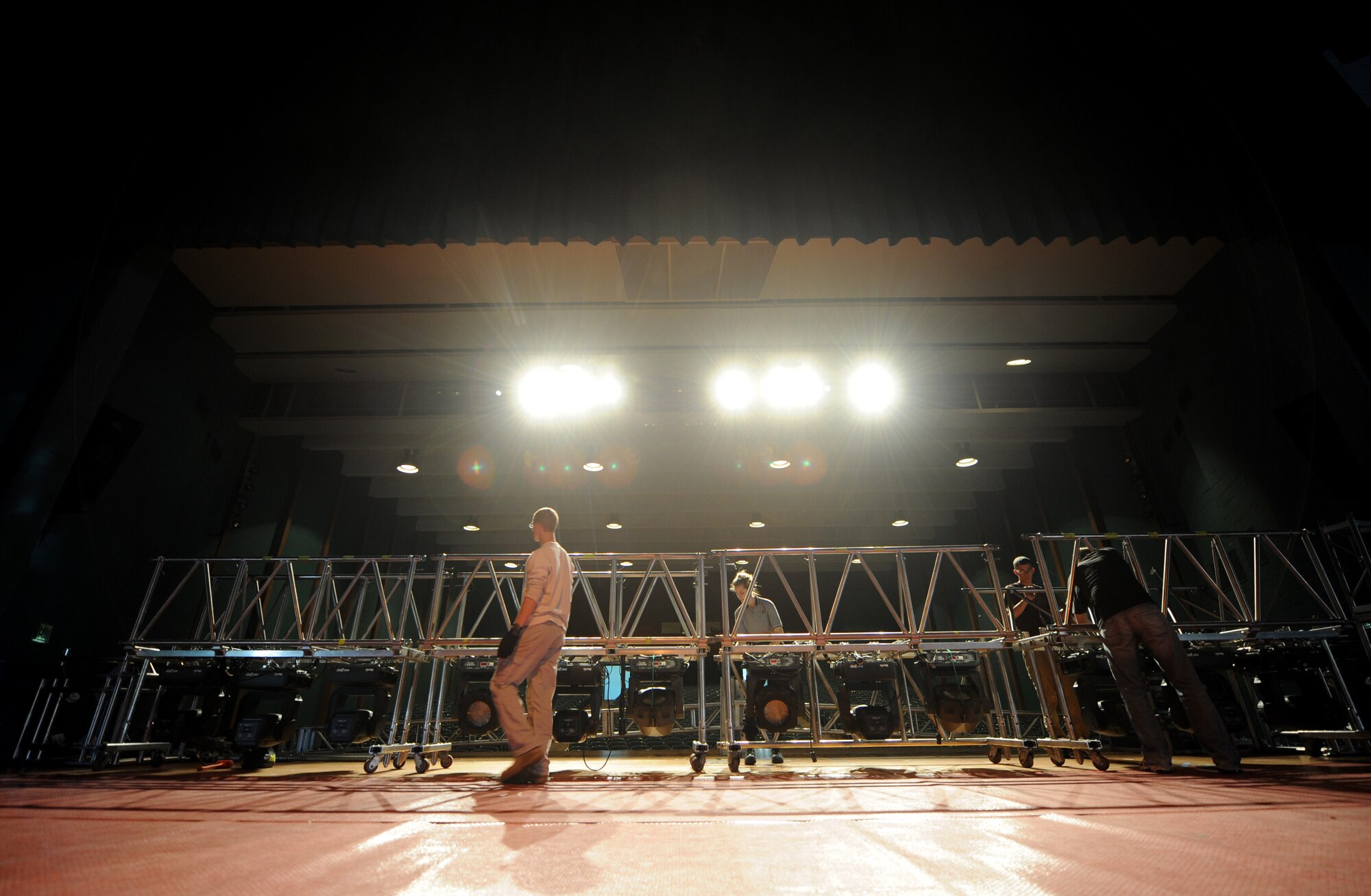 VALDOSTA, Ga. -- Volunteers from Moody Air Force Base help Tops in Blue performers set up lighting equipment before performing at the Mathis Auditorium here Nov. 4. Tops in Blue is composed of approximately 35 performers from all over the Air Force. (U.S. Air Force photo by Senior Airman Gina Chiaverotti-Paige)