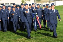 Air Force Academy Preparatory School Cadet Candidate Stephen Blackwell (right) salutes during the 2009 Parents' Weekend Parade at the U.S. Air Force Academy in Colorado. The prep school academically, physically and militarily prepares qualified young men and women to enter the Air Force Academy. Cadet Candidate Blackwell is the cadet candidate squadron commander for the 3rd Preparatory Squadron. (U.S. Air Force photo/Rachel Boettcher)