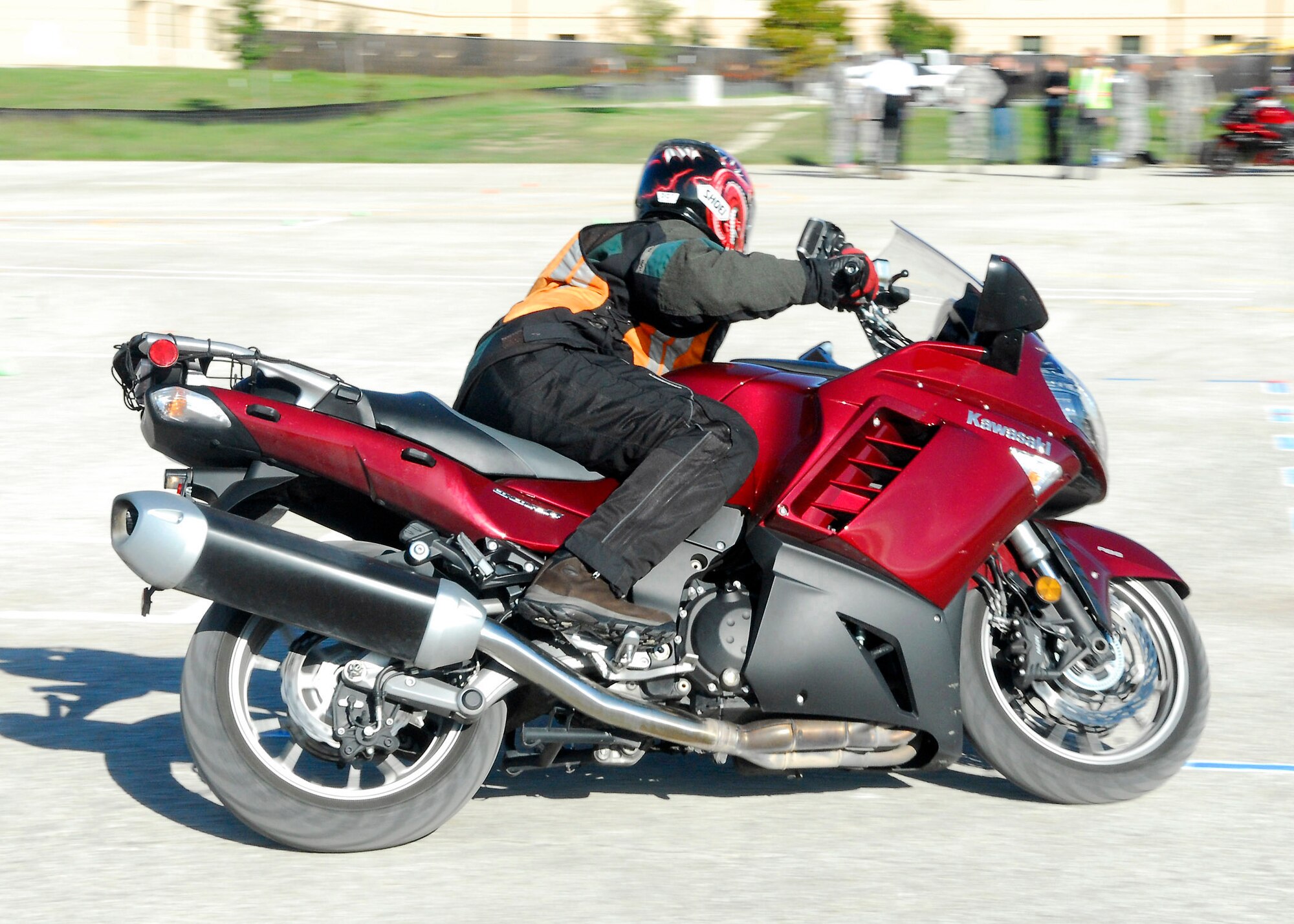 Bill James demonstrates riding techniques during the Sport Bike Safety Course on Lackland's Training Annex Oct. 30. Mr. James is with the 37th Training Wing Safety Office. (U.S. Air Force photo/Alan Boedeker)