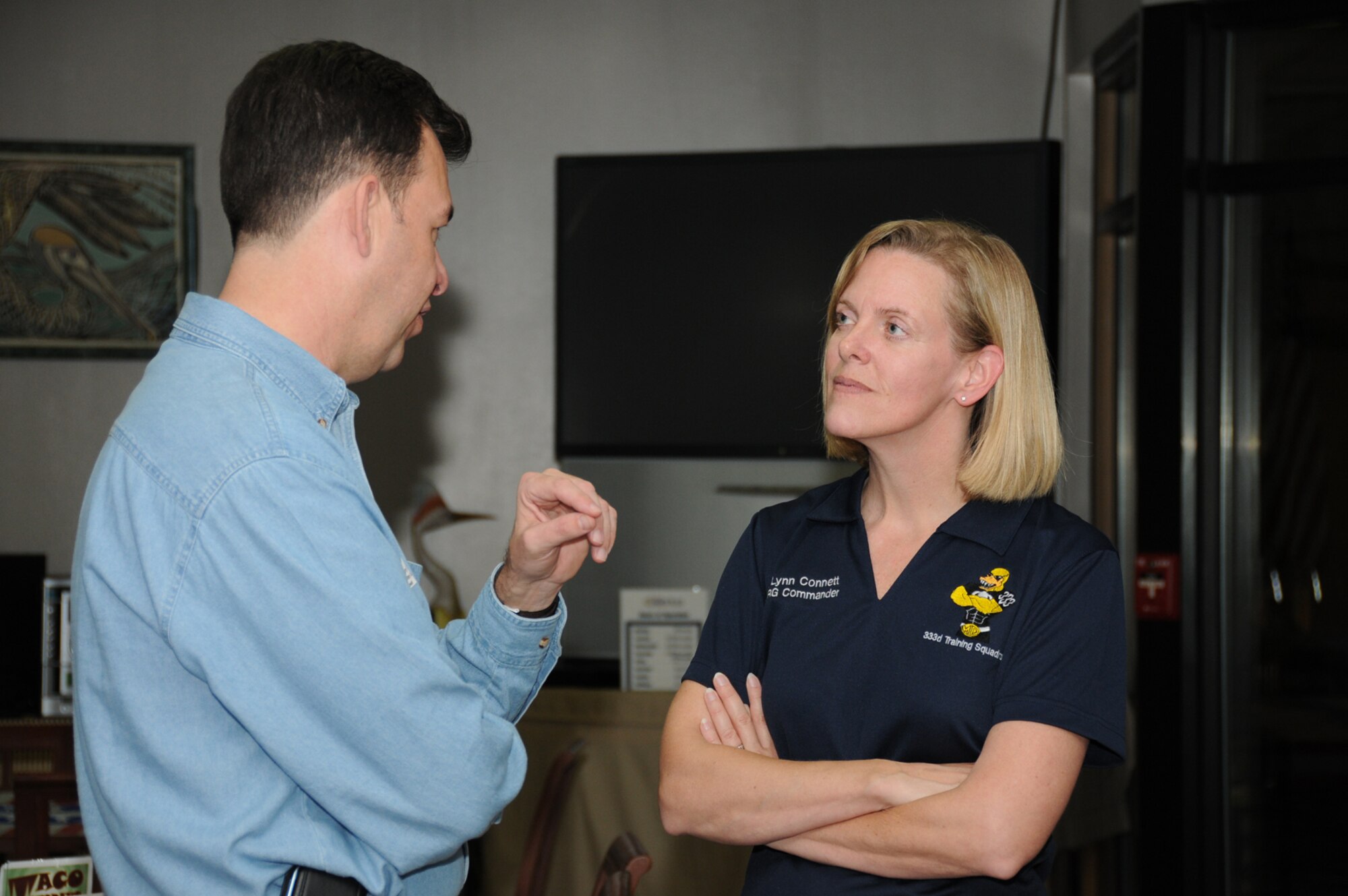 Brig. Gen. Greg Touhill, left, visits with Col. Lynn Connett, 81st Training Group commander, during Scope Warrior last week at Keesler.  General Touhill commanded the 81st Training Wing from October 2007 until last May, when he became the chief of the office of military cooperation at the U.S. Embassy in Kuwait.   Another former Keesler commander in attendance was retired Lt. Gen. Michael Peterson, who served at Keesler from May 2002 to April 2004 and retired in February as  chief, warfighting integration and chief information officer for the Secretary of the Air Force at the Pentagon.  (U.S. Air Force photo by Kemberly Groue)