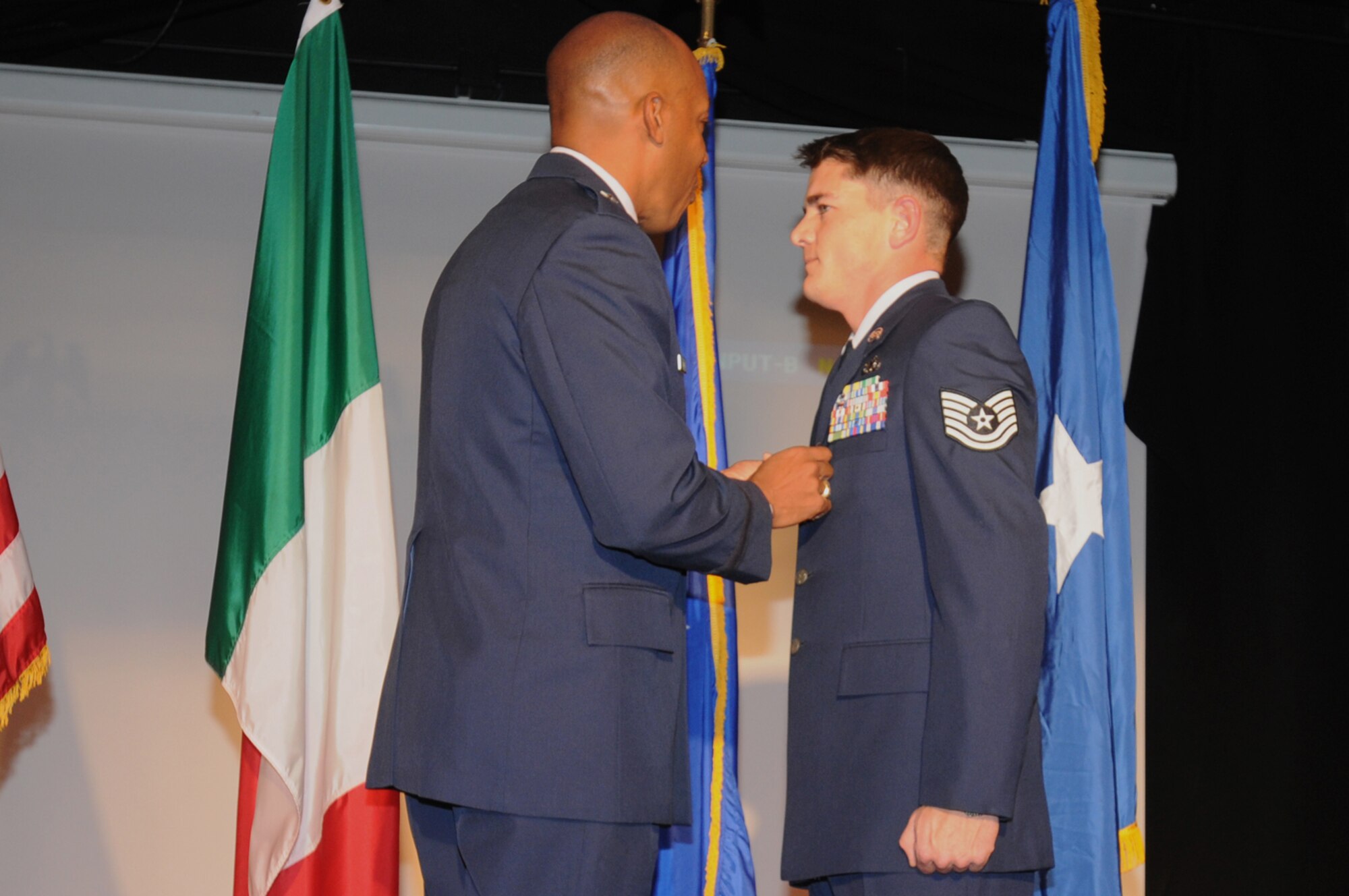 Tech. Sgt. David Albanese, 31st Logistics Readiness Squadron, non-commissioned officer in charge of vehicle maintenance customer service, is presented the Bronze Star Medal by Brig. Gen. C.Q. Brown Jr., 31st Fighter Wing commander, Nov. 03, 2009, at the community center on Aviano Air Base, Italy.  Sergeant Albanese received the medal for his professionalism and acts of valor on the field of battle during his deployment March 23, 2007 thru March 15, 2008.  While deployed in support of Operation ENDURING FREEDOM, he served as the vehicle maintenance NCOIC for a Provincial Reconstruction Team in Qalat, Zabul Province, Afghanistan.  (U.S. Air Force photo/ Staff Sgt. Patrick Dixon)