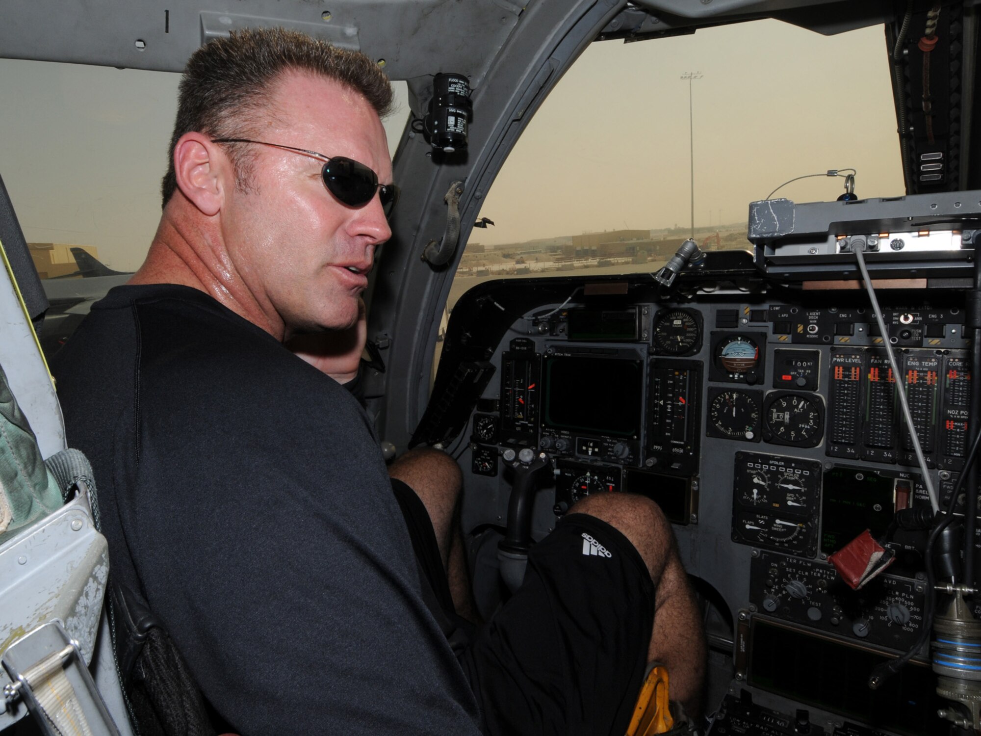 Howie Long, NFL on FOX analyst and former defensive end for the Oakland Raiders, gets a hands-on tour of a B-1B Lancer at an undisclosed location in Southwest Asia, Nov. 5, 2009. Mr. Long is touring the U.S. Central Command's area of responsibility as part of an Armed Forces Entertainment-sponsored tour. (U.S. Air Force Photo/Tech. Sgt. Jason W. Edwards)