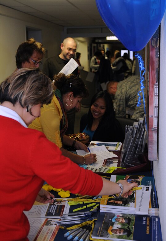 Military members and their families come visit the Airman and Family Readiness Center open house for Air Force Family Week, Ramstein Air Base, Germany, Nov. 4, 2009. Nov 1st thru the 7th is designated by Secretary of the Air Force as "Air Force Family Week". (U.S. Air Force photo by Airman 1st Class Caleb Pierce)