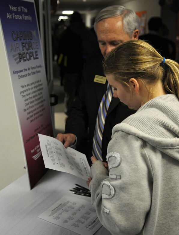 Mrs. Donna Young, wife of Senior Airman Montanna Young, 86th Vehicle Readiness Squadron, is welcomed by Mr. Steve Rose, Airman and Family Readiness Center supervisory consultant, to the open house for the Air Force Family Week, Ramstein Air Base, Germany, Nov. 4, 2009. Nov 1st thru the 7th is designated by Secretary of the Air Force as "Air Force Family Week". (U.S. Air Force photo by Airman 1st Class Caleb Pierce)