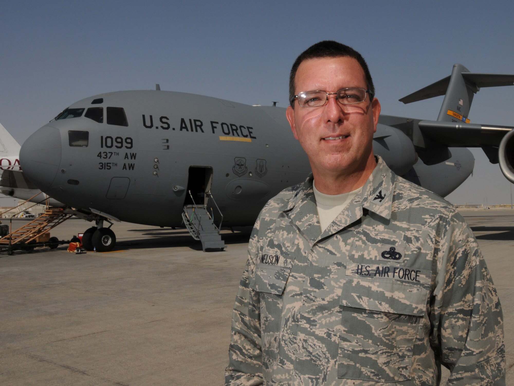 Col. Timothy Nelson, 379th Air Expeditionary Wing director of staff, revisits the C-17 Globemaster III as it reaches its 17-year mark in the Air Force inventory. Colonel Nelson was a member of the acceptance committee for this airframe while serving as an active-duty first lieutenant in the early 1990s. The committee was responsible for ensuring the new aircraft met Air Force needs and specifications. Colonel Nelson is a member of the U.S. Air Force Reserve deployed from Andrews Air Force Base, Md. in support of operations Iraqi Freedom and Enduring Freedom. (U.S. Air Force Photo/Tech. Sgt. Jason W. Edwards)