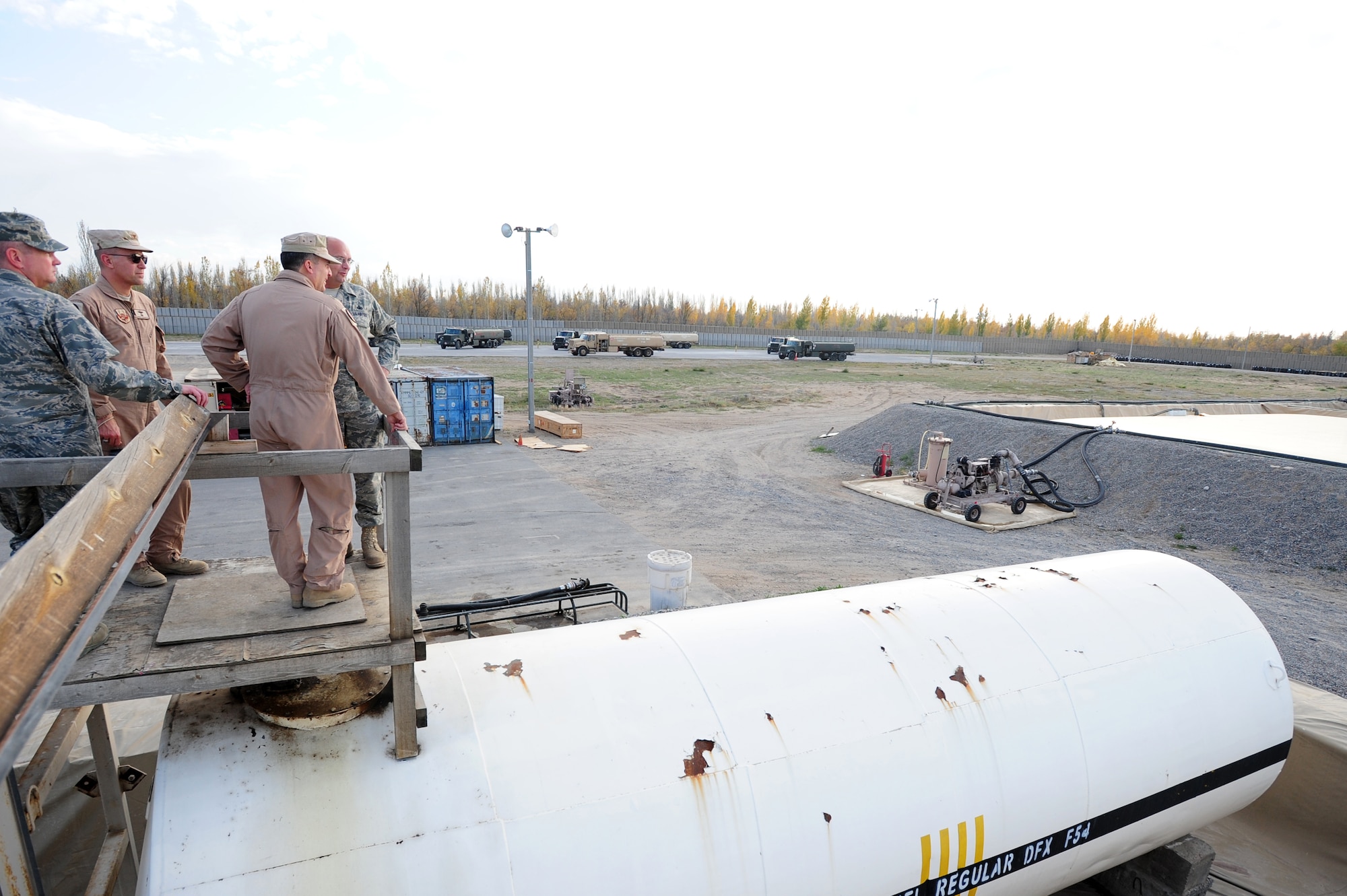 TRANSIT CENTER AT MANAS, Kyrgyzstan -- Maj. Gen. Stephen Mueller, U.S. Air Forces Central Air Component Coordination Element director, takes a view from the top at the fuel yard, Nov. 3, 2009. (U.S. Air Force photo/Senior Airman Steele C. G. Britton)