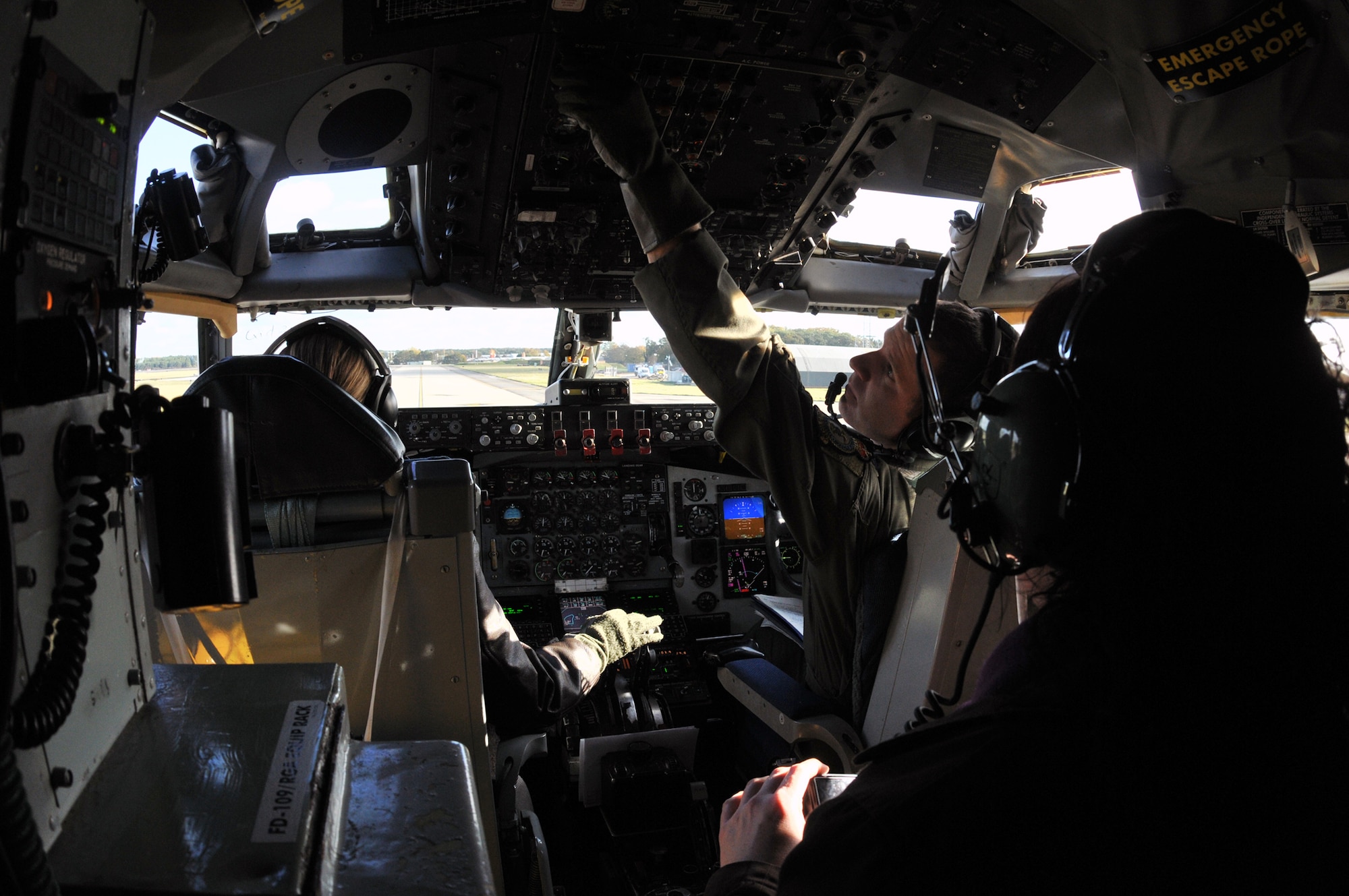 Capt. Ryan Covahey, mission Quid 34 aircraft commander, adjusts a cockpit guage as the plane prepares for takeoff prior to a Community Orientation Flight Nov. 4. Orientation flights give distinguished visitors a detailed look at the heart of the base mission and enable them to make balanced decisions in the course of their community work. (U.S. Air Force photo/Tech. Sgt. Kevin Wallace)