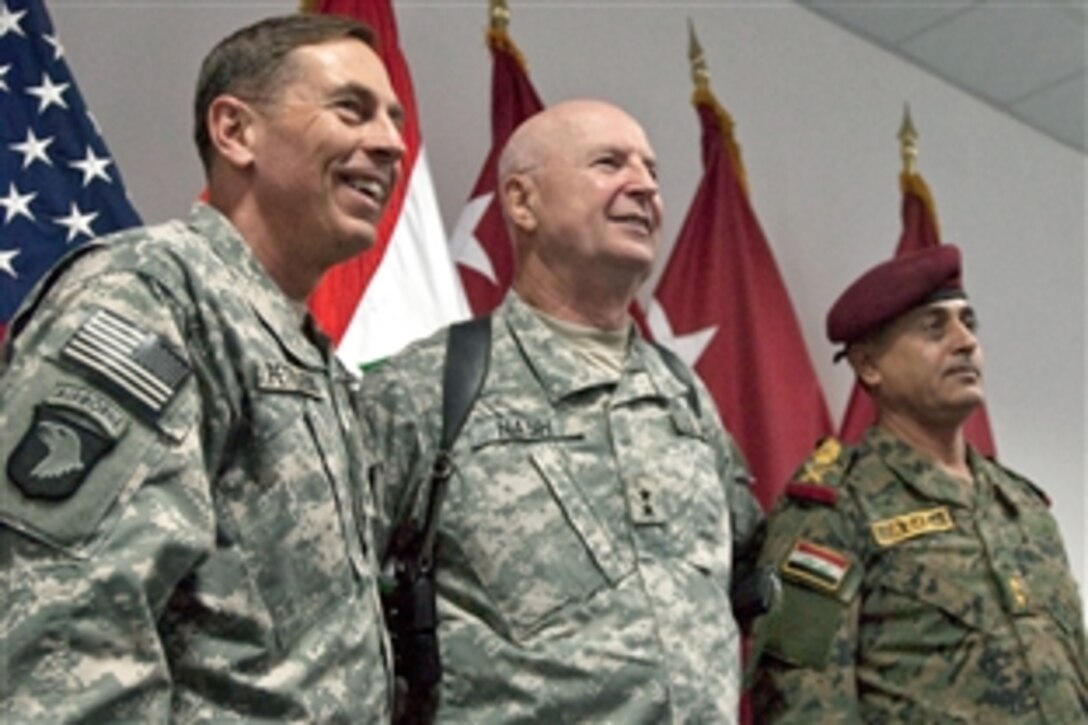 U.S. Army Gen. David Petraeus, head of U.S. Central Command, meets with Minnesota Army National Guard Maj. Gen. Rick Nash, commander, Multinational Division South, and Staff Maj. Gen. Abdul Aziz Aswadi, commander of the 14th Iraqi Army Infantry Division, during a visit on Contingency Operating Base Basra, Iraq, Oct. 31, 2009.