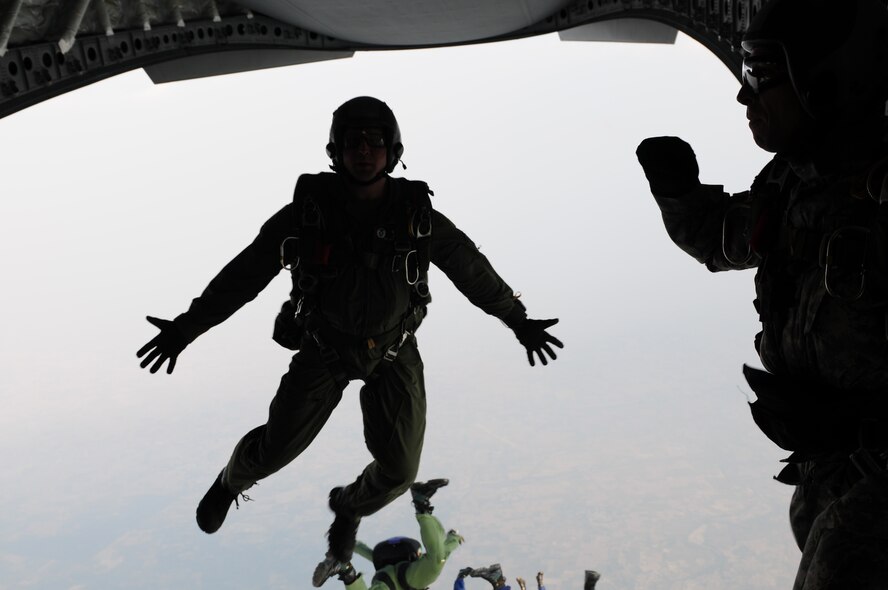 A U.S. Air Force Master Sgt. assigned to the 353rd Combat Training Squadron jumps out of a C-17 Globemaster III during the first ever combined HALO mission with the United States and Indian air forces at Air Force Station Agra. More than 150 U.S. Air Force and Army personnel are deployed to India for Cope India, a humanitarian assistance disaster relief exercise. (U.S. Air Force photo/Capt. Genieve David) 