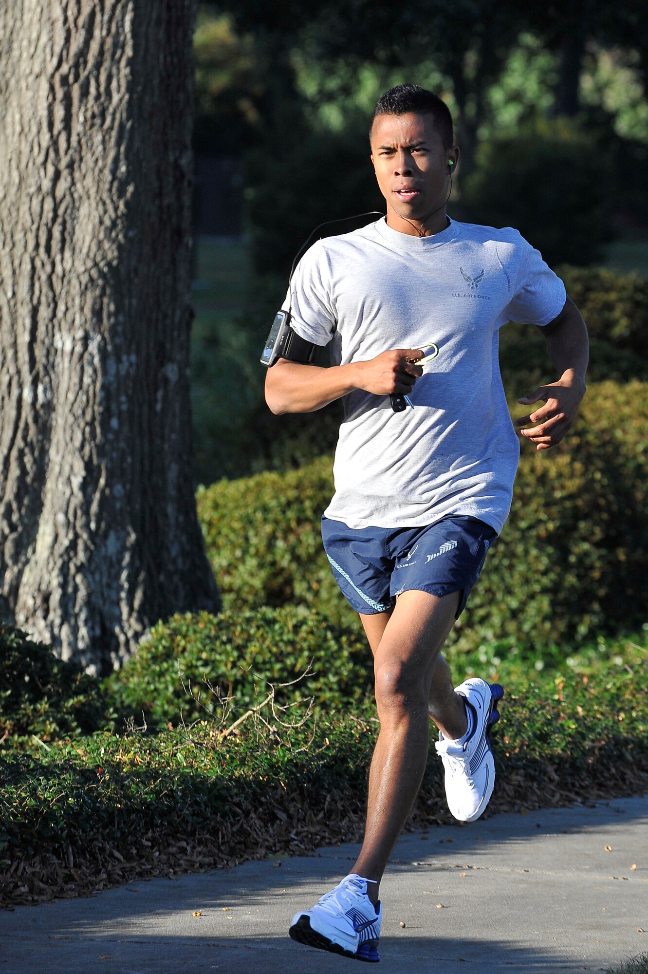 Senior Airman Terrell Pretlow finishes first for the men in the Commander's 5K Run/Walk Challenge held here Nov. 6 with a time of 18:45. A fitness challenge is conducted the first Friday of each month at Charleston AFB, promoting a base-wide fitness culture. Airman Pretlow is a utilities technician with the 437th Civil Engineer Squadron. (U.S. Air Force photo/James Bowman)