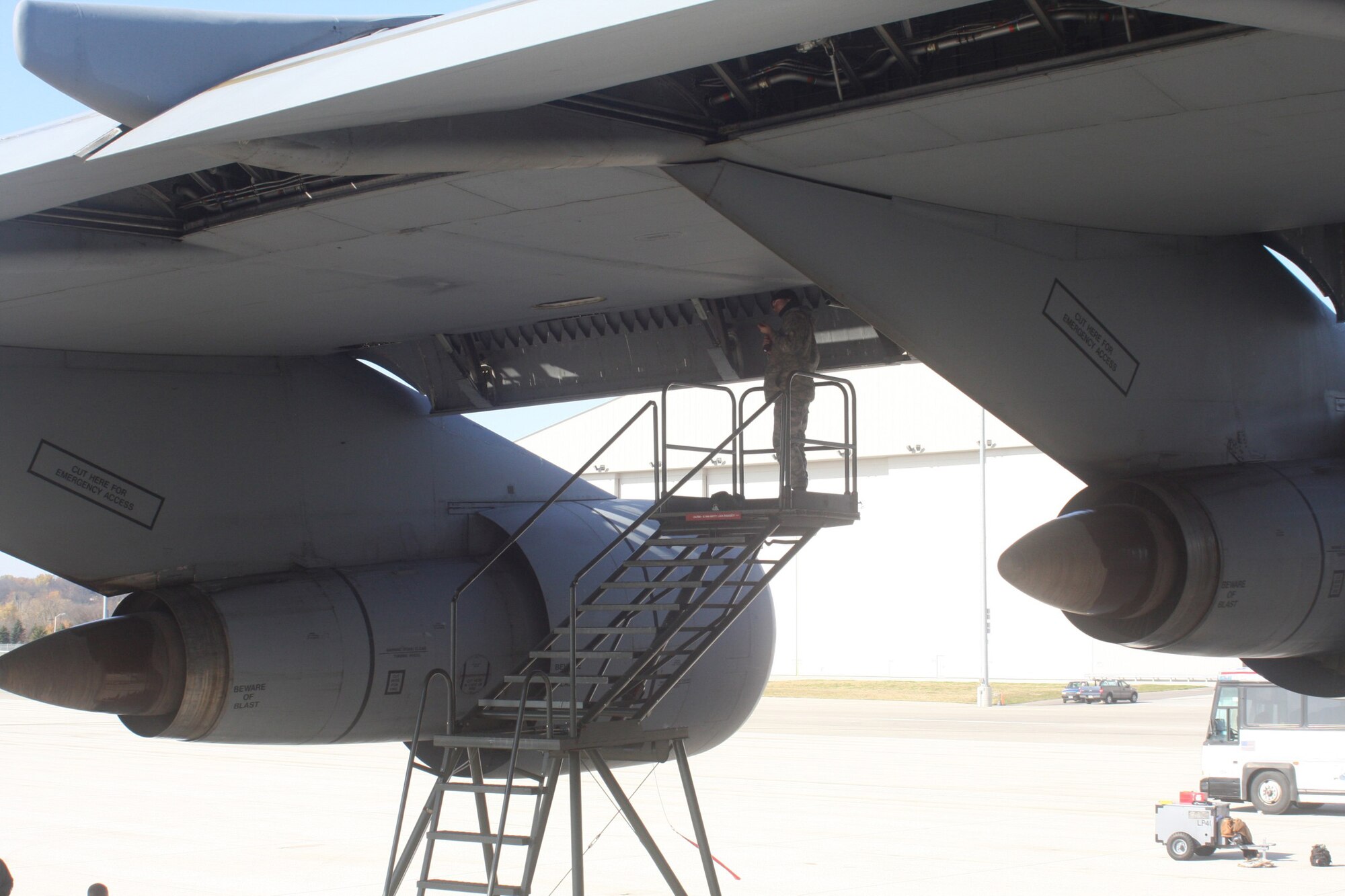 WRIGHT-PATTERSON AIR FORCE BASE, Ohio – Airman First Class Mike Bernat, 445th Aircraft Maintenance Squadron, does some spot underneath the wing of a C-5 Galaxy.  The 445th Airlift Wing has 10 C-5s, which are the largest aircraft in the Air Force inventory. (U. S. Air Force photo/Stacy Vaughn)