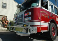96th Civil Engineer Squadron firefighters exit a Duke Field building after responding to an emergency call Nov. 6.  The firefighters entered the building and cleared it to ensure it was safe.  (Air Force photo/Staff Sgt. Samuel King Jr.) 