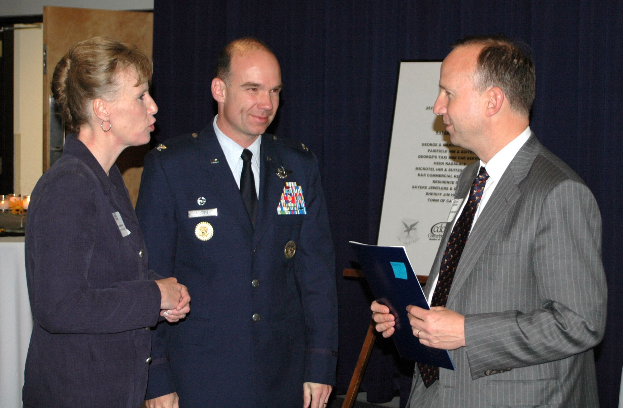 436th Airlift Wing Commander Col. Manson O. Morris and his wife Heidi speak to Delaware Governor Jack Markell at the Military Affaire at The Landings here Nov. 4. This annual event is hosted by the Central Delaware Chamber of Commerce and the Air Force Association's Galaxy Chapter. (U.S. Air Force photo/2nd Lt. Adam Gregory)
