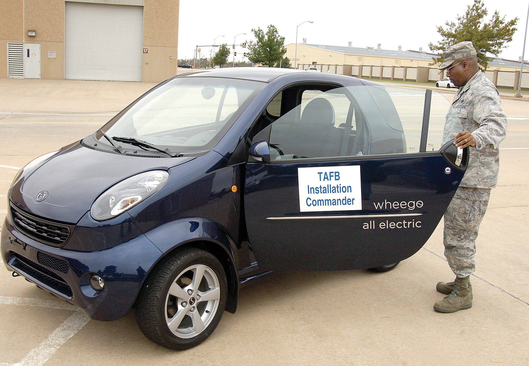 Col. Allen Jamerson, 72nd Air Base Wing and Tinker installation commander, drove an electric car for a week during Energy Awareness Month. The car runs on a 96-volt battery and can reach 40 mph. (Air Force photo by Margo Wright)