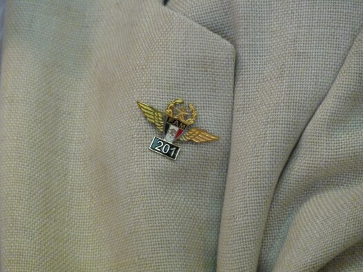 The replica of the original wings and squadron designation is worn on the lapels by all members of the Aztec Eagles. (U.S. Air Force photo by Lt. Col. Susan A. Romano)