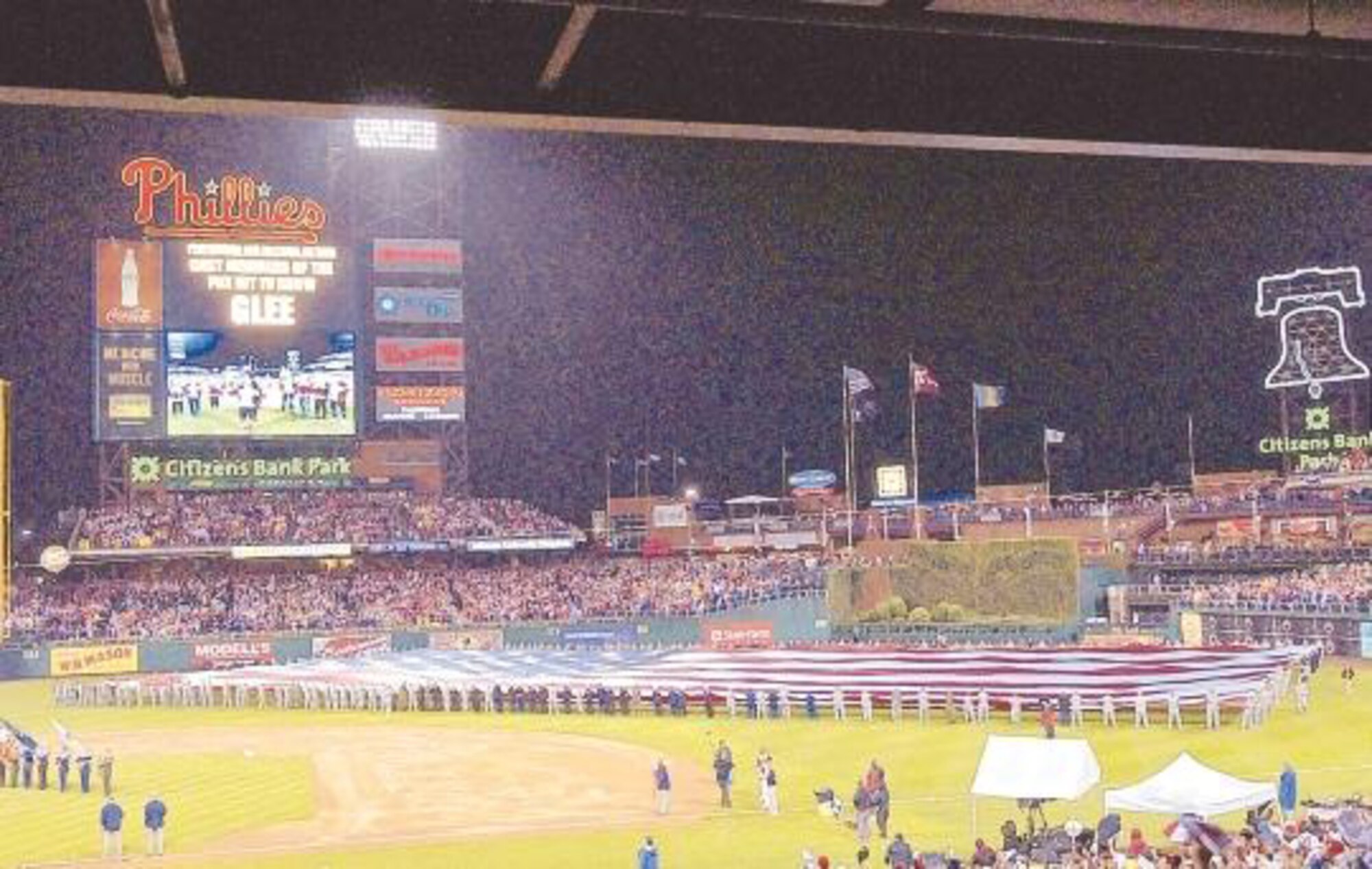 Master Sgt. Eric Sellars, 512th Aerospace Medicine Squadron NCO in charge of laboratory services here, was one of the 150 service members who held the U.S. flag during the national anthem before Game 3 of the World Series at Citizens Bank Park Oct. 31. (Courtesy photo)
