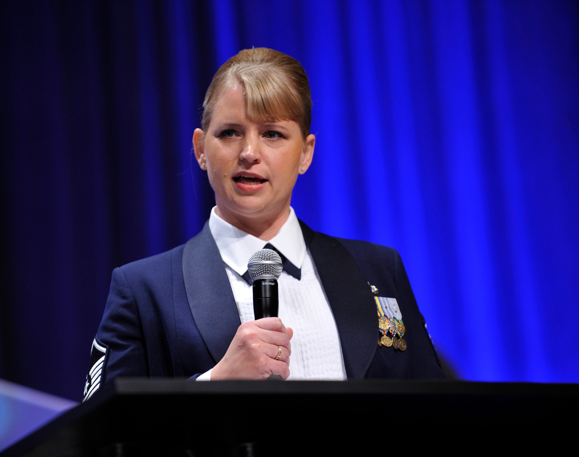 Master Sergeant Kristen M. Orcutt, Air Force Special Operations Command, gives her acceptance speech after recieving the Karen E. Yates-Popwell Award at The U.S. Air Force Judge Advocate General Corps' Keystone Conference 2009,  Dallas, Texas, October 29, 2009. (U.S. Air Force photo by Jim Varhegyi)