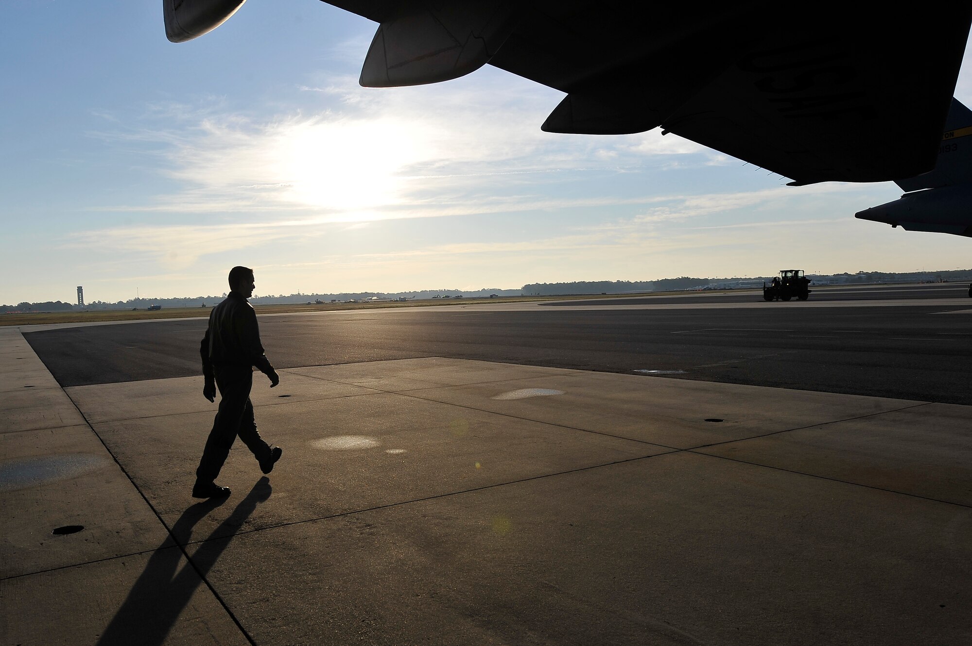 Capt. Patrick Woodall performs a walk-around inspection on a C-17 aircraft prior to a routine training mission here Nov. 4. Charleston AFB's flying squadrons performed more than 270 training missions during the month of October to keep aircrews proficient on flying skills such as take-offs, landings and the use of night vision equipment. Captain Woodall is a pilot with the 16th Airlift Squadron. (U.S. Air Force photo/James Bowman)