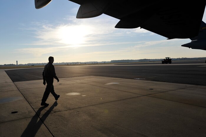 Capt. Patrick Woodall performs a walk-around inspection on a C-17 aircraft prior to a routine training mission here Nov. 4. Charleston AFB's flying squadrons performed more than 270 training missions during the month of October to keep aircrews proficient on flying skills such as take-offs, landings and the use of night vision equipment. Captain Woodall is a pilot with the 16th Airlift Squadron. (U.S. Air Force photo/James Bowman)