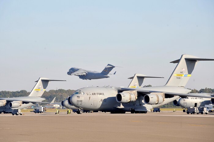 A C-17 aircraft takes off for a routine mission here Nov. 4. Charleston is currently home to more than 50 C-17 aircraft. Once fully airborne, the C-17 has a cruising speed of approximately 500 mph, providing a high-speed global mobility platform for the U.S. military. (U.S. Air Force photo/James Bowman)