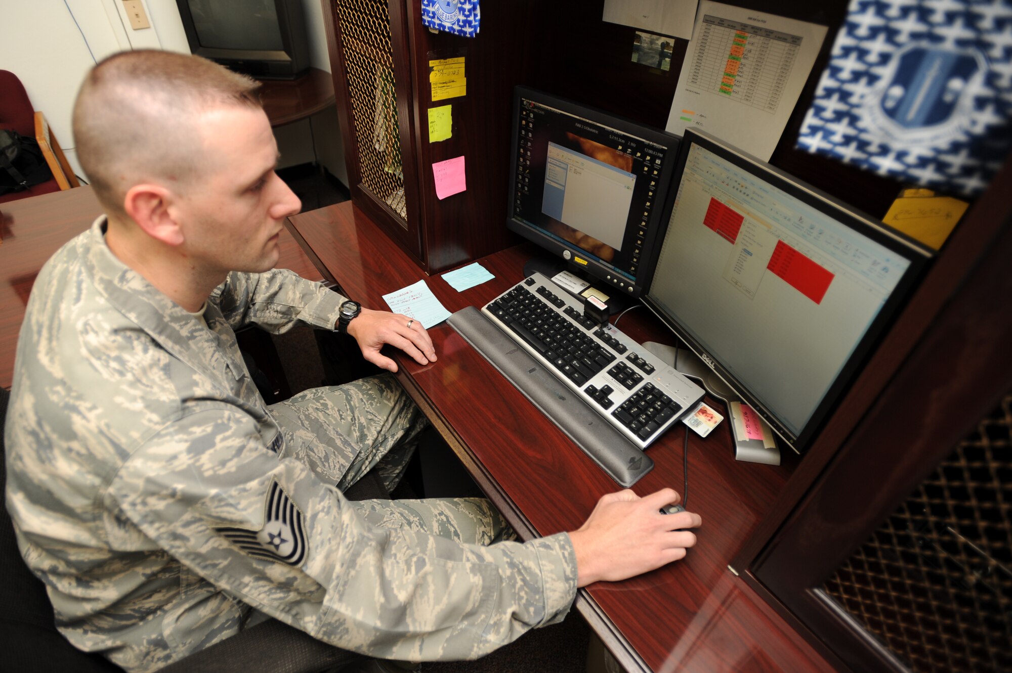 Tech. Sgt. Bryan A. Williamson, 19th Maintenance Operations Squadron scheduling element NCO-in-charge, runs training reports for monthly statistical data Nov. 3 for the 19th Maintenance Group. Sergeant Williamson has scheduled more than 430 training events, tripling demand response. He also graduated magna cum laude with a Bachelor's Degree in Human Resources. (U. S. Air Force photo by Senior Airman Jim Araos)