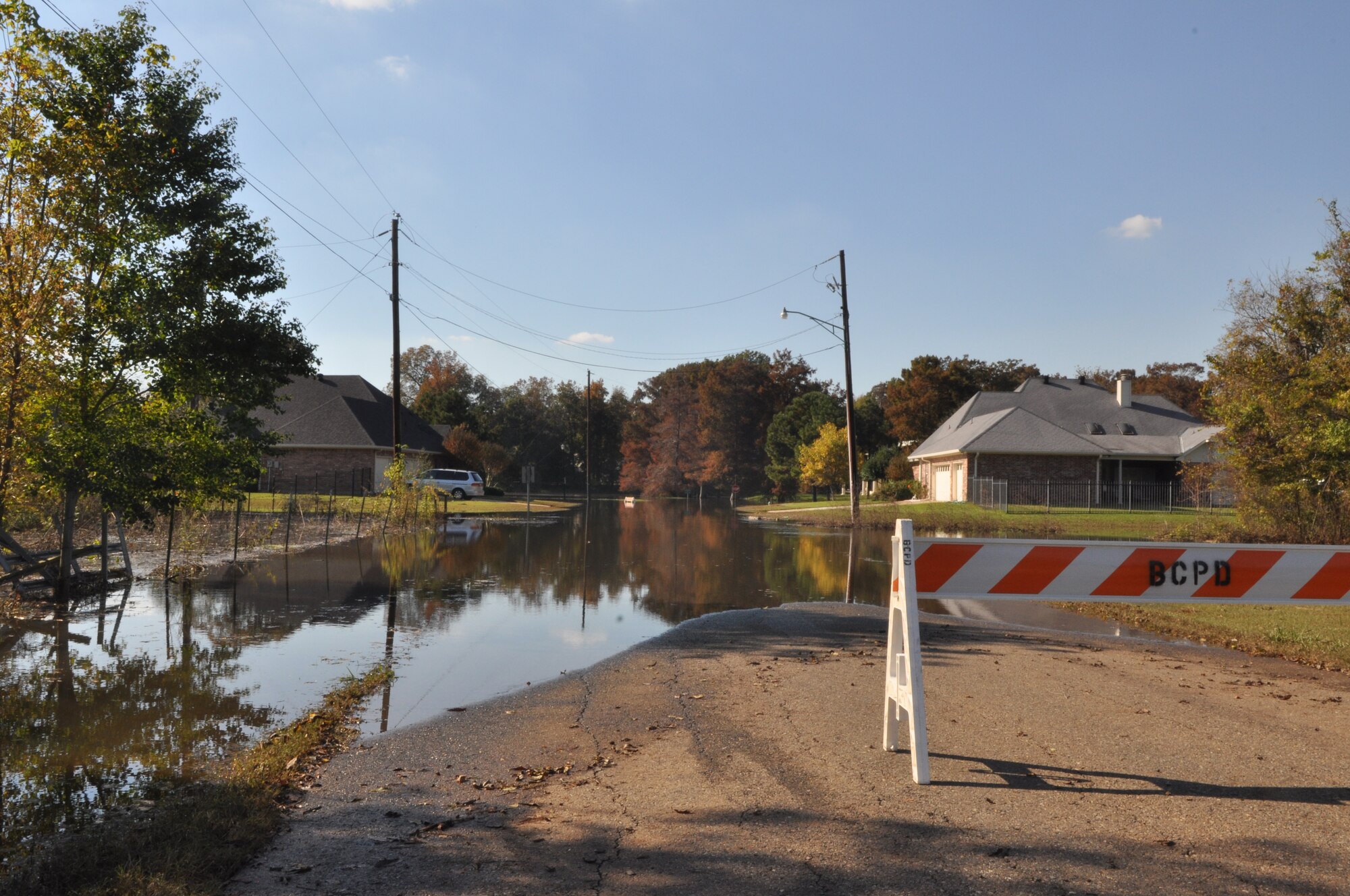 Flooded Lakeside Drive in northern Bossier Parish is near impassable November 4, 2009. Hundreds of Airmen from Barksdale Air Force Base La., joined together with Soldiers from the 527th Engineers of the Louisiana National Guard and other volunteers on Oct. 31 to sand bag a levee containing the Red Chute Bayou.  Sand bags were still being placed during the evening of November4. (U.S. Air Force photo/Tech. Sgt. Jeff Walston)