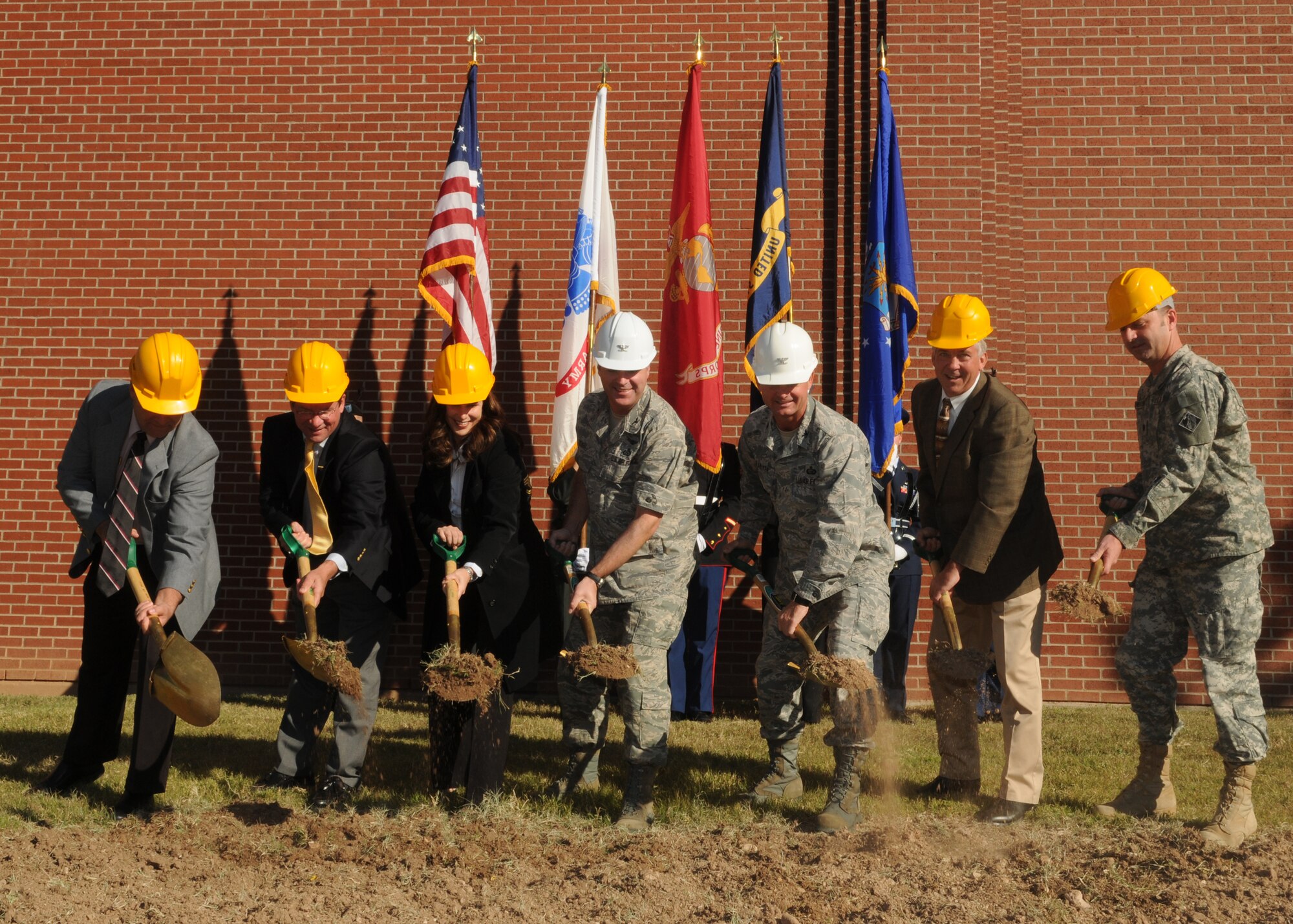 GOODFELLOW AIR FORCE BASE, Texas -- Col. Thomas Geary (center), 17th Training Wing commander, and local dignitaries perform the ceremonial ground-breaking for the expansion to the Mathis Fitness Center, Nov. 4, 2009. The expansion will add 15,485 square feet to the facility and is expected to be completed early 2011. (U.S. Air Force photo/Airman Clayton Lenhardt)