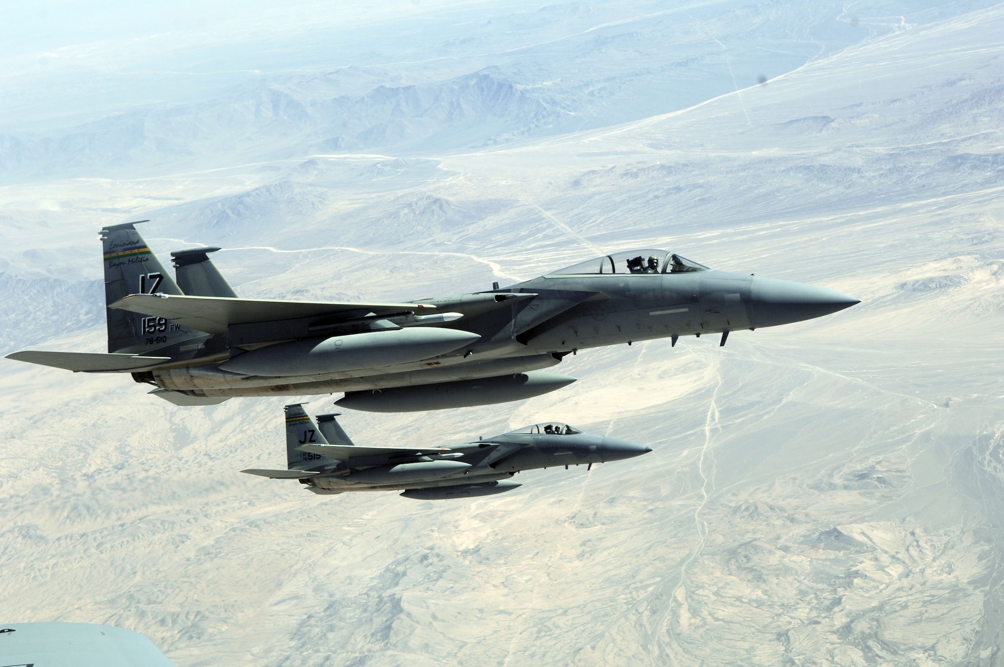 A pair of F-15 Eagles with the 159th Fighter Wing fly in a wingtip formation off the wing of a KC-135 Stratotanker during a refueling mission Oct. 22, 2009, over Chile. The Chilean air force hosted the United States, Brazil, Argentina and France during Exercise Salitre, a multinational exercise focused on interoperability. (U.S. Air Force photo/Tech. Sgt. Eric Petosky) 