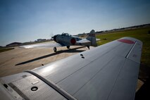 Japanese A6M2 Zero replica built from T-6 Texan (N4447) revs up the engine to test the throttle shortly before taking off from San Antonio International Airport, Texas on Nov. 5, 2009.  Disabled American Veterans (DAV) Flight Team organized flights aboard historic and experimental air show aircraft for wounded warriors from the Warrior Transition Unit of the San Antonio Military Medical Center at Fort Sam Houston, Texas, two days before the Randolph Air Force Base "Forging the Future" Air Show.  DAV a non-profit organization that provides services in support of disabled veterans is not endorsed by the U.S. Air Force.  20th Century Fox had several made for the movie Tora, Tora, Tora and Midway. After the movies collectors bought the planes, Tora, Tora, Tora bought  these and have used them for 37 seasons of WWII attack performances. DAV is a non-profit organization that provides services in support of disabled veterans Tora, Tora, Tora nor DAV are endorsed by the U.S. Air Force.   (U.S. Air Force photo/Lance Cheung)

