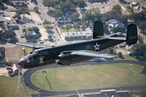 The B-25 Mitchell medium bomber "Special Delivery" took off from San Antonio International Airport, Texas and flew near the downtown district on Nov. 5, 2009. Tower of Americas, Texan Culture Center, and the Alamo are some of the notable sights below. Larry Gregory is one of the pilots of the B-25 of the Lone Star Flight Museum. Disabled American Veterans (DAV) Flight Team organized flights aboard approximately 10 historic or experimental air show aircraft for wounded warriors from the Warrior Transition Unit of the San Antonio Military Medical Center at Fort Sam Houston, Texas, two days before the Randolph Air Force Base "Forging the Future" Air Show.  DAV a non-profit organization provides services in support of disabled veterans. This is not an U.S. Air Force endorsement of DAV. (U.S. Air Force photo/Lance Cheung)
