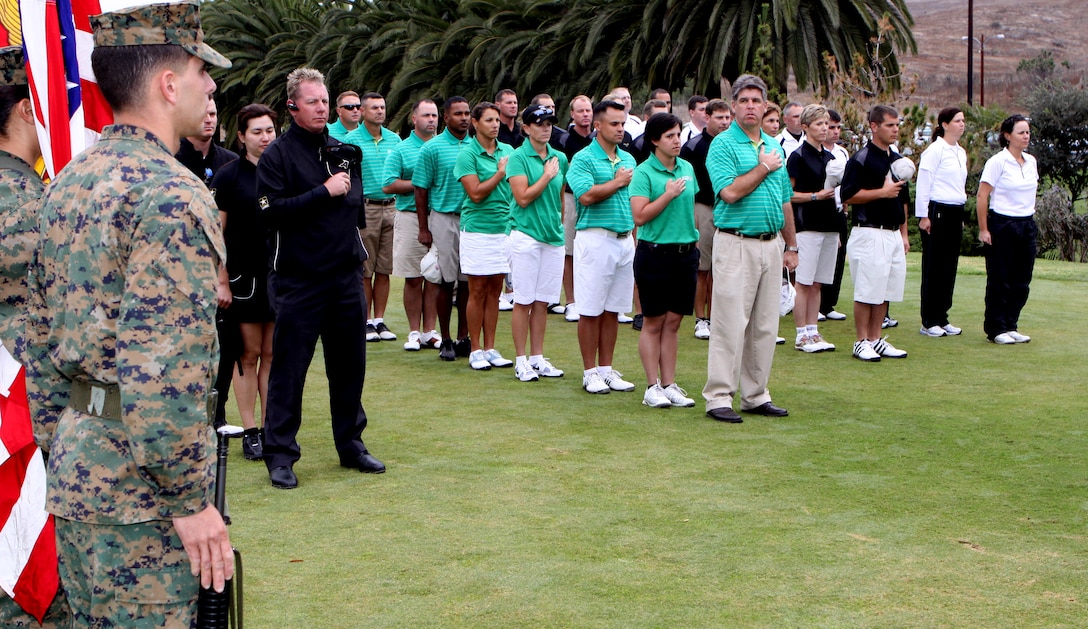 More than 30 service members from the U.S. Army, Navy, Air Force and Marine Corps, honor the flag as the national anthem is played during the opening ceremony of the 2009 Armed Services Golf Tournament, held at Camp Pendleton, Nov. 7 to 10.