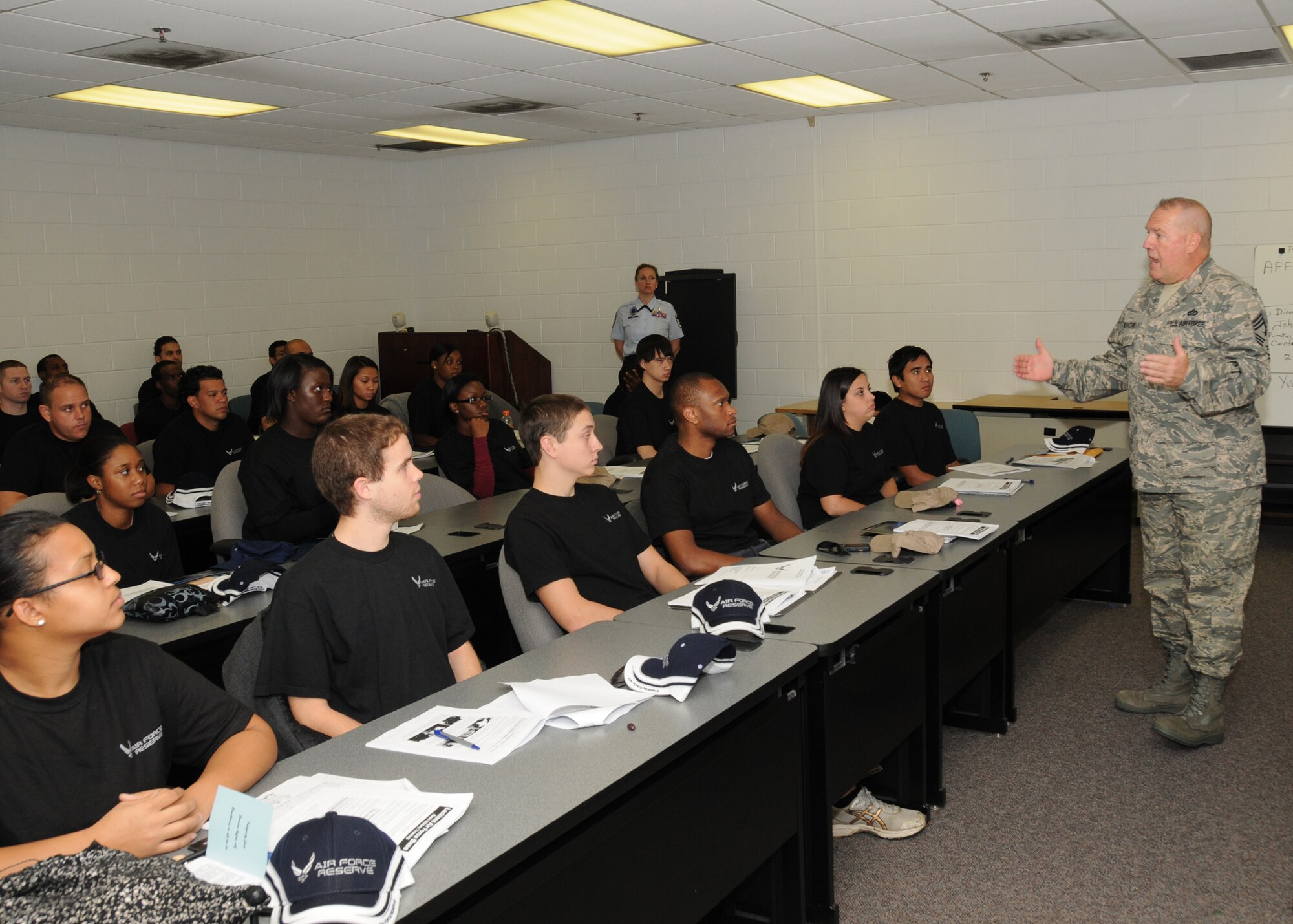 Chief Master Sgt. John M. Anderson, 94th Airlift Wing Command Chief, gives words of inspiration to Delayed Entry Program recruits Nov. 7  on what it means to be an Airman in today’s Air Force Reserve. (U.S. Air Force photo/Tech. Sgt. Nicholas B. Ontiveros)