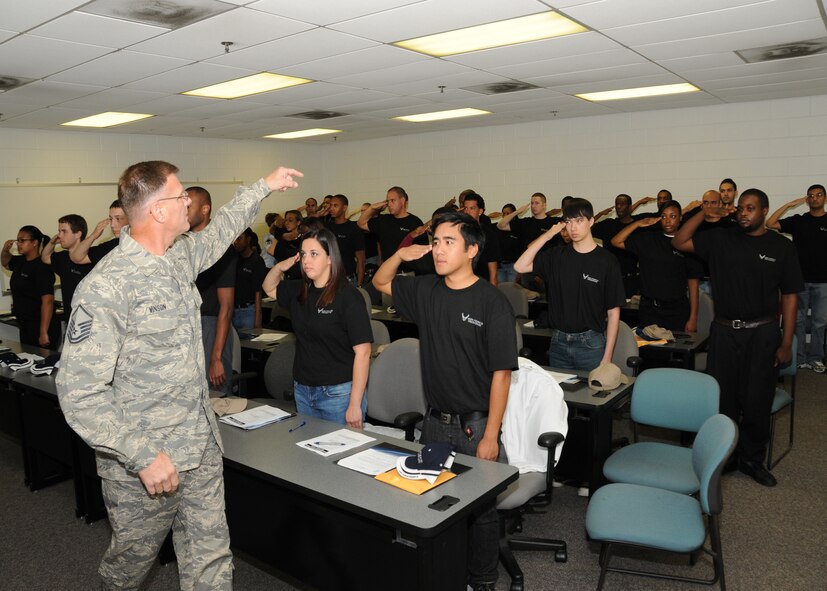 Master Sgt. Johnny Vinson, 94th Maintenance Squadron, instructs Delayed Entry Program recruits on how to execute a correct salute during the 94th Airlift Wing's Nov.7 unit training assembly.  
The Air Force Delayed Entry Program is an Air Force program under which a future Airman may enlist in a Reserve unit of the United States Air Force and specify a future reporting date to attend basic training.  (U.S. Air Force photo/Tech. Sgt. Nicholas B. Ontiveros)