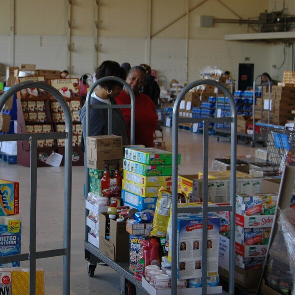 Military members, retirees and dependents take advantage of savings at the case lot sale at Dobbins Air Reserve Base Nov. 7. The Defense Commissary Agency holds periodical case lot sale events, offering customers bulk quantities of their favorite products at increased savings, such as canned goods, beverages, cleaning or laundry products, meat and produce. The next case lot sale is scheduled for Feb. 5-7, 2010. (U.S. Air Force photo/Tech. Sgt. James Branch)